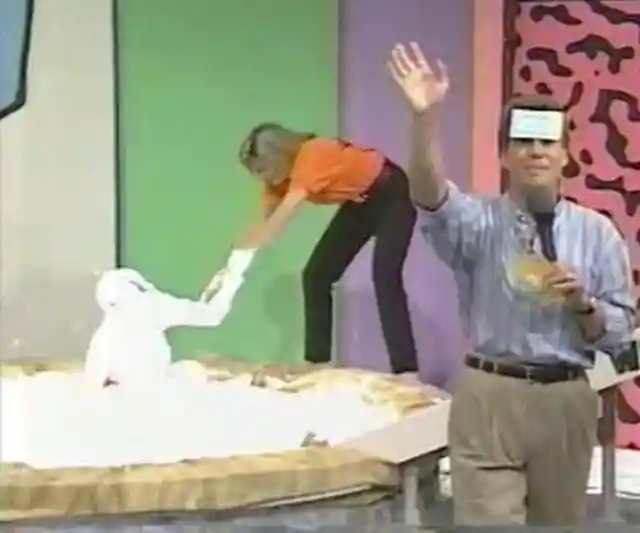 Which Nick trivia show involved a pie slide into whipped cream?