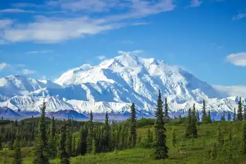 What was the official name given to Denali, the highest mountain peak in North America? 